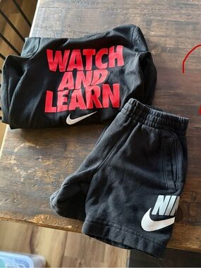 Nike Kids Black Athletic Shorts with Red 'Watch and Learn' Top